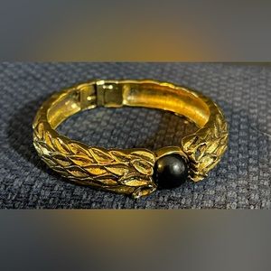 Vintage SJC Hinged Bracelet.  Gold tone with Black Cabichon